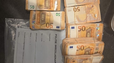 Tonnen cash en tientallen kilo’s hasj en wiet gevonden in verborgen ruimte bij bedrijf in Tilburg