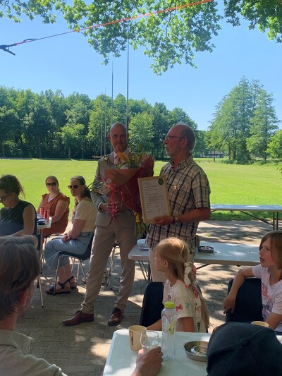 Predicaat Bewijs van Verdienste voor Henk van de Klundert