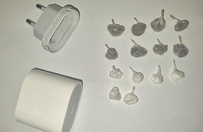 Dealer in Best betrapt met bolletjes met cocaïne en heroïne in adapter